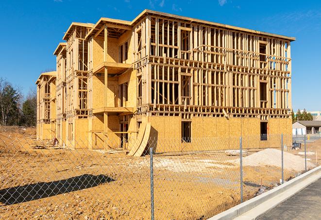 a panoramic view of temporary chain link fences on a construction site, separating work zones in Alhambra CA